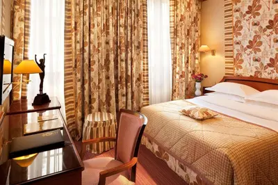 Un ou plusieurs lits dans un hébergement de l'établissement Hôtel Horset Opéra, Best Western Premier Collection