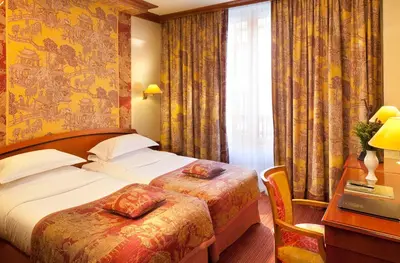 Un ou plusieurs lits dans un hébergement de l'établissement Hôtel Horset Opéra, Best Western Premier Collection