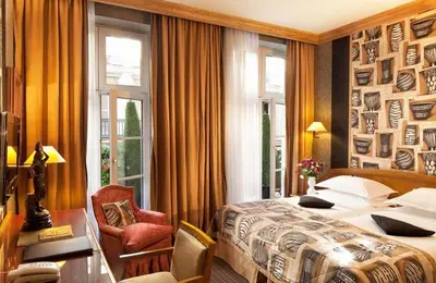 Un ou plusieurs lits dans un hébergement de l'établissement Hôtel Horset Opéra, Best Western Premier Collection