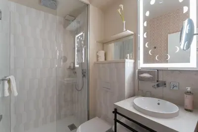 Salle de bains dans l'établissement Hotel Astra Opera - Astotel