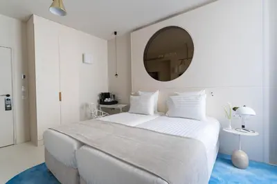 Un ou plusieurs lits dans un hébergement de l'établissement Hotel Astra Opera - Astotel
