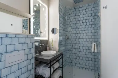 Salle de bains dans l'établissement Hotel Astra Opera - Astotel
