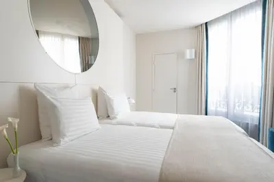 Un ou plusieurs lits dans un hébergement de l'établissement Hotel Astra Opera - Astotel