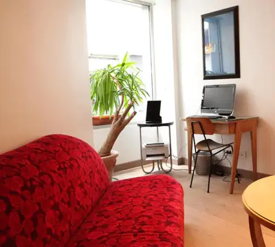 Télévision ou salle de divertissement dans l'établissement Hotel Aulivia Opéra