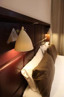 Un ou plusieurs lits dans un hébergement de l'établissement Hotel Aulivia Opéra
