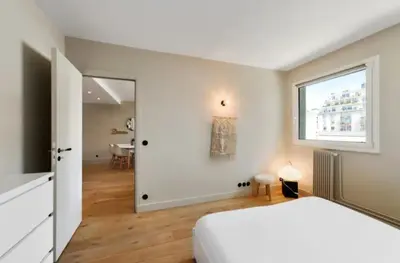 Un ou plusieurs lits dans un hébergement de l'établissement Beautiful 1 Bedroom Apartment near Eiffel Tower