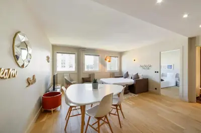 Coin salon dans l'établissement Beautiful 1 Bedroom Apartment near Eiffel Tower