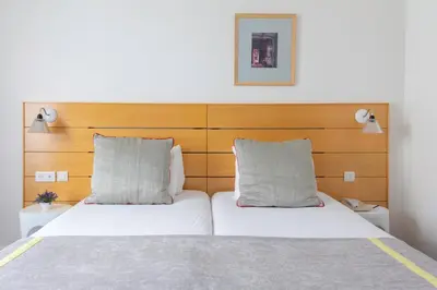 Un ou plusieurs lits dans un hébergement de l'établissement Hotel Lorette - Astotel