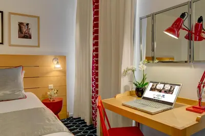 Un ou plusieurs lits dans un hébergement de l'établissement Hotel Lorette - Astotel