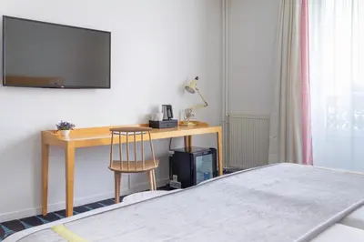 Un ou plusieurs lits dans un hébergement de l'établissement Hotel Lorette - Astotel