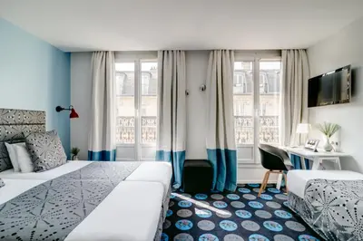 Un ou plusieurs lits dans un hébergement de l'établissement Hotel Astoria - Astotel