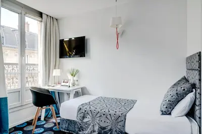 Un ou plusieurs lits dans un hébergement de l'établissement Hotel Astoria - Astotel