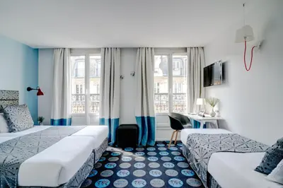Un ou plusieurs lits dans un hébergement de l'établissement Hotel Astoria - Astotel