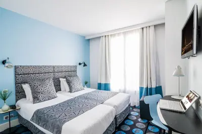 Un ou plusieurs lits dans un hébergement de l'établissement Hotel Astoria - Astotel