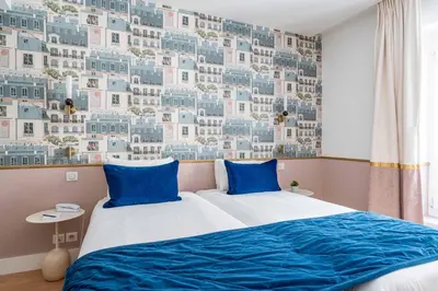Un ou plusieurs lits dans un hébergement de l'établissement Hotel Acadia - Astotel