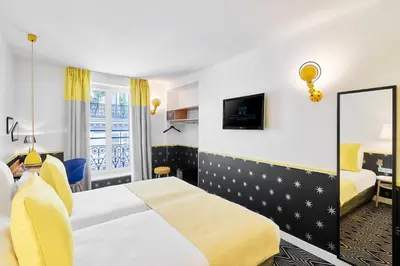 Un ou plusieurs lits dans un hébergement de l'établissement Hôtel Augustin - Astotel