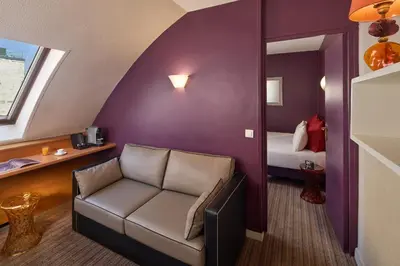 Coin salon dans l'établissement Timhotel Invalides Eiffel