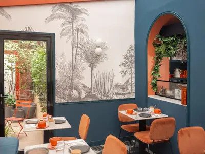 Coin salon dans l'établissement Hôtel Biskui