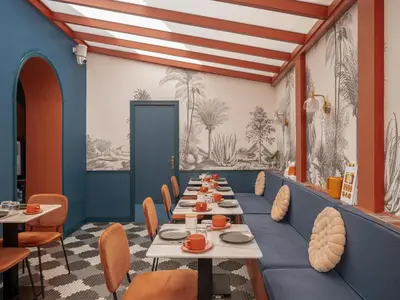 Coin salon dans l'établissement Hôtel Biskui