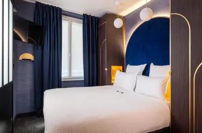 Un ou plusieurs lits dans un hébergement de l'établissement Best Western Plus Bretagne Montparnasse