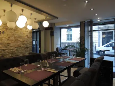 Coin salon dans l'établissement Hôtel Eden Opéra