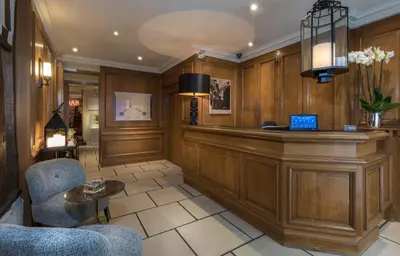 Télévision ou salle de divertissement dans l'établissement Dauphine Saint Germain