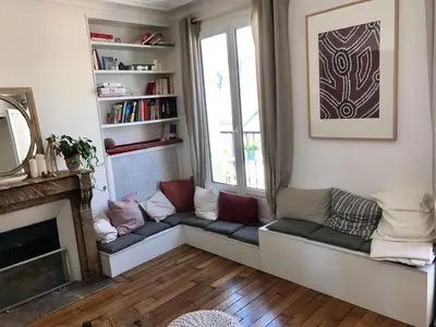 Coin salon dans l'établissement Appartement Lombards 2 bedroom CityCosy