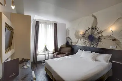 Un ou plusieurs lits dans un hébergement de l'établissement Hotel Vivaldi