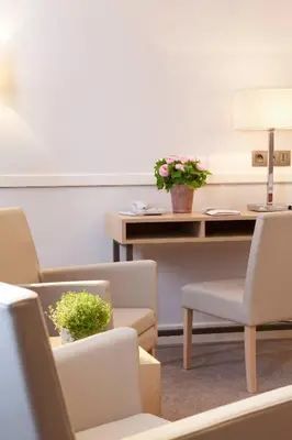 Coin salon dans l'établissement Floride-Etoile