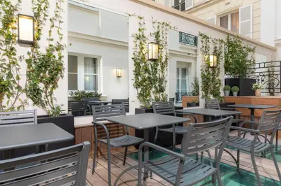 Restaurant ou autre lieu de restauration dans l'établissement Elysées Ceramic
