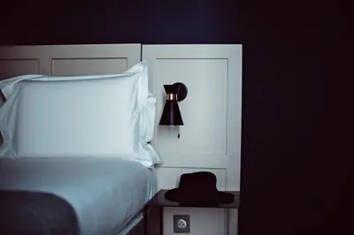 Un ou plusieurs lits dans un hébergement de l'établissement Hotel Monsieur Helder