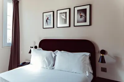Un ou plusieurs lits dans un hébergement de l'établissement Hotel Monsieur Helder