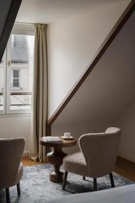 Coin salon dans l'établissement Hotel Pulitzer Paris