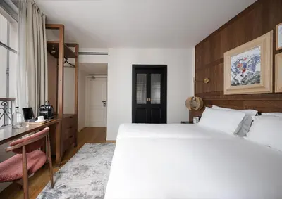 Un ou plusieurs lits dans un hébergement de l'établissement Hotel Pulitzer Paris