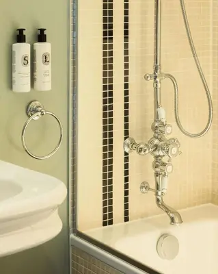 Salle de bains dans l'établissement Hôtel Des Grands Voyageurs