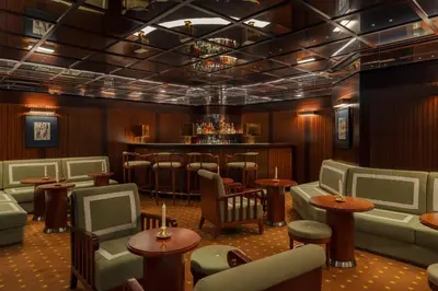 Coin salon dans l'établissement Hôtel Des Grands Voyageurs