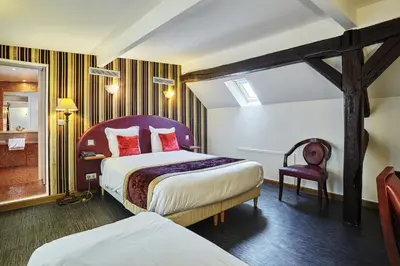 Un ou plusieurs lits dans un hébergement de l'établissement Hotel Opéra d'Antin