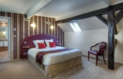 Un ou plusieurs lits dans un hébergement de l'établissement Hotel Opéra d'Antin