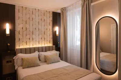 Un ou plusieurs lits dans un hébergement de l'établissement Best Western Au Trocadéro