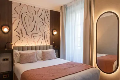 Un ou plusieurs lits dans un hébergement de l'établissement Best Western Au Trocadéro