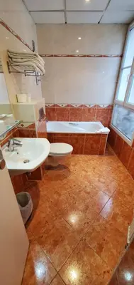 Salle de bains dans l'établissement Metropol