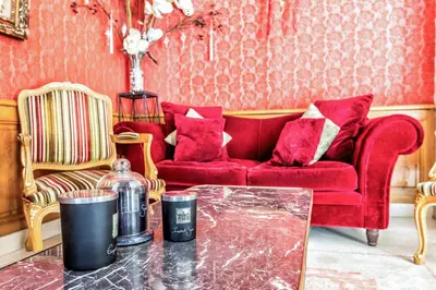 Coin salon dans l'établissement Hotel Regence Paris