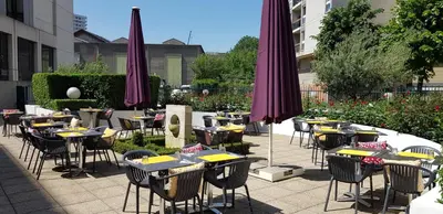 Restaurant ou autre lieu de restauration dans l'établissement B&B HOTEL Paris 17 Batignolles