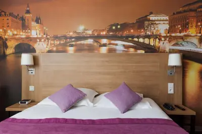 Un ou plusieurs lits dans un hébergement de l'établissement Best Western Rives de Paris La Defense