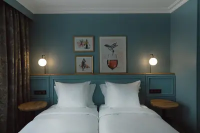 Un ou plusieurs lits dans un hébergement de l'établissement XO Hotel Paris
