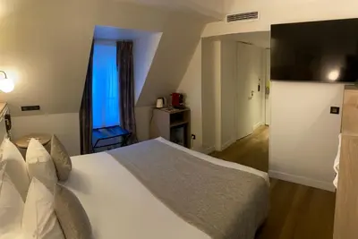 Télévision ou salle de divertissement dans l'établissement XO Hotel Paris