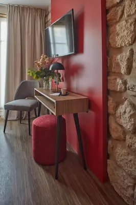 Télévision ou salle de divertissement dans l'établissement Hotel Atmospheres