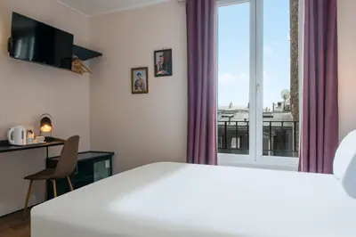 Un ou plusieurs lits dans un hébergement de l'établissement Hôtel Istria by Magna Arbor