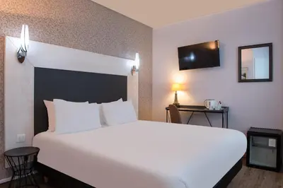 Un ou plusieurs lits dans un hébergement de l'établissement Hôtel Istria by Magna Arbor