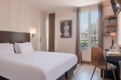 Un ou plusieurs lits dans un hébergement de l'établissement Hôtel Istria by Magna Arbor